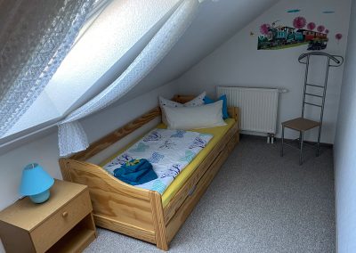 Ferienwohnung Hegner - Kinderschlafzimmer Ausziehbett