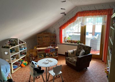 Ferienwohnung Hegner - Kinderspielzimmer Ausgang Dachterrasse
